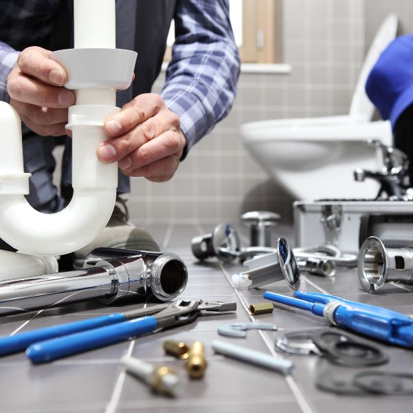 Plumber with tools
